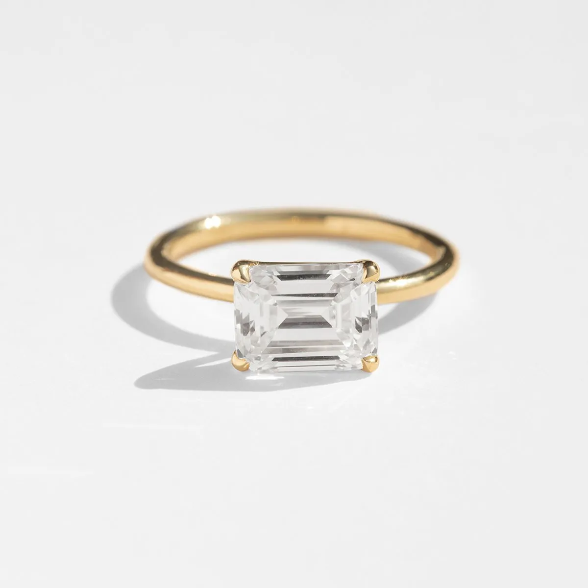 East-West Halo Diamond Engagement Ring